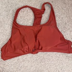 Rusty colored bathing suit top